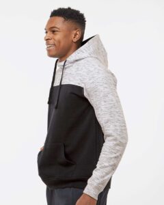J. America 8676 Men’s Mélange Fleece Colorblocked Hooded Sweatshirt – Black/ White (on model side)