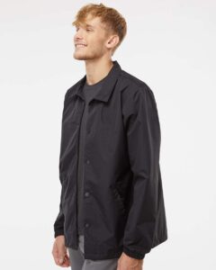 Independent Trading Co. EXP99CNB Men’s Water-Resistant Windbreaker Coach’s Jacket – Black/ Black (on model side)