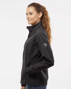 DRI DUCK 9439 Women’s Contour Soft Shell Jacket – Charcoal (on model side)