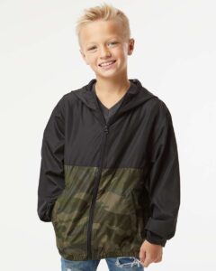 Independent Trading Co. EXP24YWZ Youth Lightweight Windbreaker Full-Zip Jacket – Black/ Forest Camo (on model)