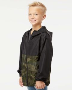 Independent Trading Co. EXP24YWZ Youth Lightweight Windbreaker Full-Zip Jacket – Black/ Forest Camo (on model side)