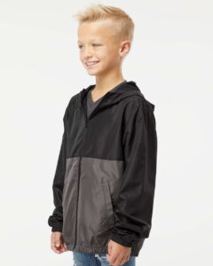 Independent Trading Co. EXP24YWZ Youth Lightweight Windbreaker Full-Zip Jacket – Black/ Graphite (on model side)