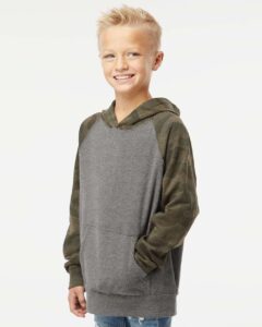 Independent Trading Co. PRM15YSB Youth Lightweight Special Blend Raglan Hooded Sweatshirt – Nickel Heather/ Forest Camo (on model side)