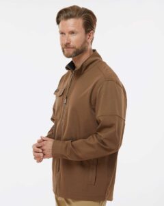 DRI DUCK 5327 Men’s Ace Woven Stretch Soft Shell Jacket – Field Khaki (on model side)