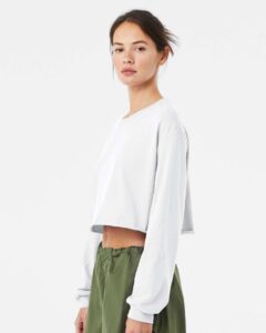BELLA + CANVAS 6501 Women’s FWD Fashion Crop Long Sleeve Tee – White (on model side)