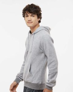 J. America 8709 Men’s Flip Side Fleece Hooded Sweatshirt – Grey Heather (on model side)