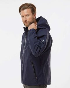 DRI DUCK 5335 Unisex Torrent Waterproof Hooded Jacket – Navy (on model side)