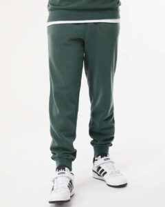 Independent Trading Co. PRM50PTPD Unisex Pigment-Dyed Fleece Sweatpants – Pigment Alpine Green (on model)
