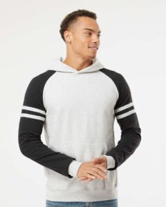 JERZEES 97CR Unisex Nublend® Varsity Colorblocked Raglan Hooded Sweatshirt – Oatmeal Heather/ Black Ink (on model)