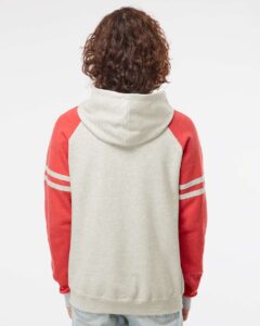 JERZEES 97CR Unisex Nublend® Varsity Colorblocked Raglan Hooded Sweatshirt – Oatmeal Heather/ Fiery Red Heather (on model back)