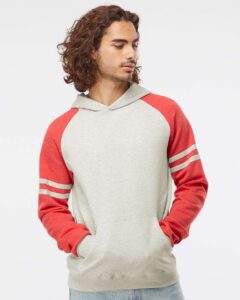 JERZEES 97CR Unisex Nublend® Varsity Colorblocked Raglan Hooded Sweatshirt – Oatmeal Heather/ Fiery Red Heather (on model)