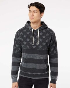 J. America 8871 Men’s Triblend Fleece Hooded Sweatshirt – Black Stars & Stripes Triblend (on model)