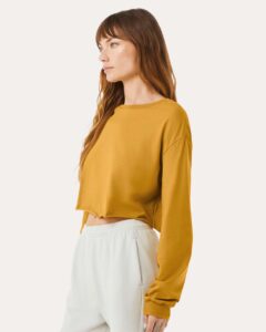 BELLA + CANVAS 6501 Women’s FWD Fashion Crop Long Sleeve Tee – Mustard (on model side)